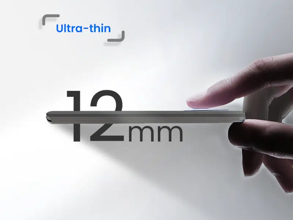 Asset Tracker LT held between two fingers, showing how thin the case is
