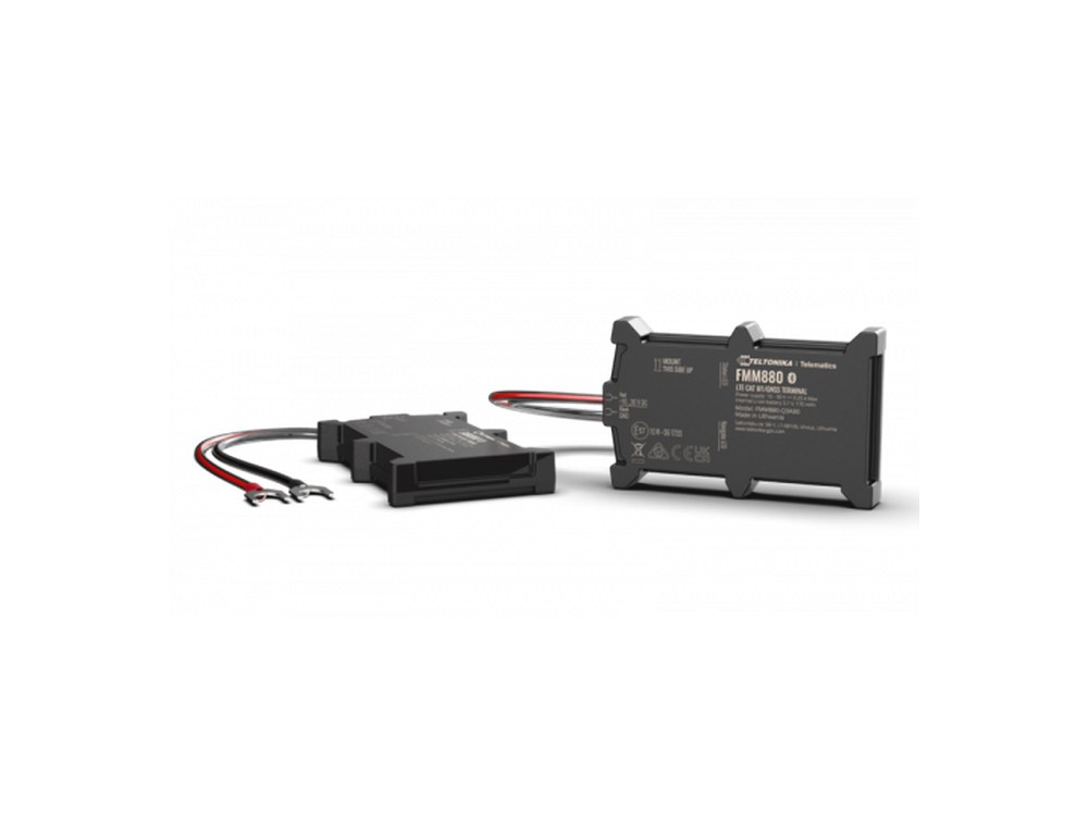 Teltonika FMM880 tracker with its power cable and connectors